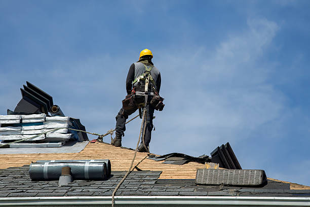 Professional Roofing technician working in Yale, OK